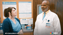 a man in a lab coat with a name tag that says boston on it