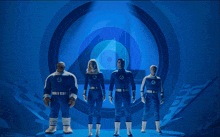 a poster for the fantastic four shows a group of superheros standing on a stage