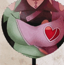 a pink and green balloon with a heart on the side