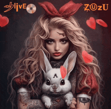 a woman holding a rabbit with the letter a on its face