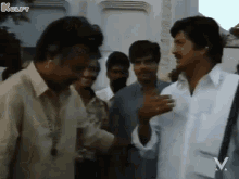 Throwback Rajinikanth Taking Blessings From Mohan Babu Pedarayudu GIF