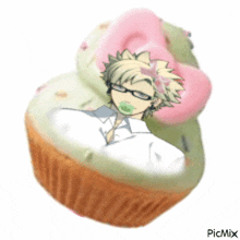 a cupcake with a picture of a person on it