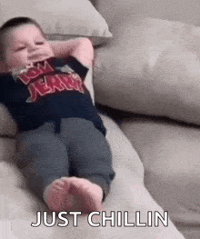 Lil Kid Chilling Chilling On Couch GIF