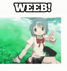 a girl in a school uniform is sitting in the grass and giving a thumbs up .