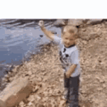 Baby Throw GIF - Baby Throw Throwing Stones GIFs