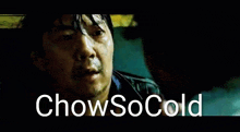 a close up of a man 's face with the words `` chow so cold '' above him .