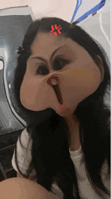 a woman with a cartoon face has a red angry symbol on her forehead