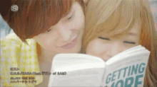 Couple Reading GIF - Couple Reading Book GIFs