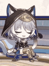a cartoon character is sitting on a couch wearing a cat hood .