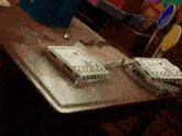 a wooden table with two boxes on it that say ' sss ' on them