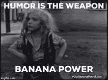 Banana Power Humor Is The Weapon GIF - Banana Power Humor Is The Weapon Hair Flip GIFs