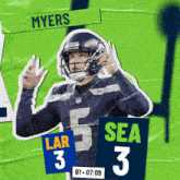 seahawks quarterback larry myers holds up his hands in the air
