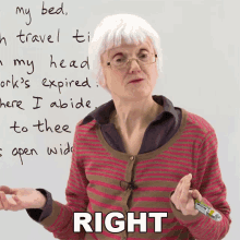 an elderly woman stands in front of a whiteboard with the words right written on it