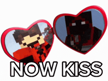 a pair of heart shaped mirrors with the words now kiss