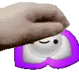 a hand is holding a purple heart with a white face behind it .