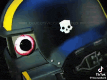 a close up of a helmet with a skull on it that says tik tok