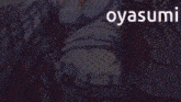 a close up of a girl 's stomach with the word oyasumi written above it