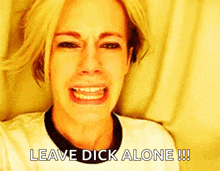 a woman is crying with the words " leave dick alone " written below her