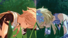 a boy and a girl are laying in the grass together