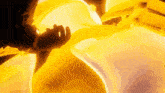 a close up of a person 's hand holding a yellow object .