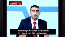 a man in a suit and tie says i challenge brother al-tamimi to check out his underwear ..