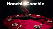 a woman is doing a split on a red table with the words hoochie coochie written above her