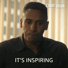 a man says " it 's inspiring " in front of a countdown logo