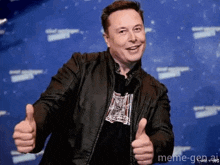 elon musk is smiling and giving a thumbs up sign