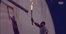 Igniting The Olympic Fire Igniting The Fire GIF - Igniting The Olympic Fire Olympic Fire Igniting The Fire GIFs