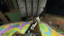 a screenshot of a video game shows a person holding a rifle