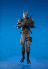 a werewolf with a sword is dancing on a blue screen