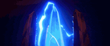 a blue light is coming out of a hole in a rock .