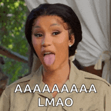a woman sticking her tongue out with the words aa aa aa lmao on the bottom
