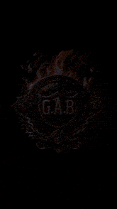 a logo for g.a.b. with flames surrounding it
