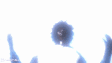 a silhouette of a man and woman kissing in the dark .