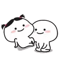 a boy and a girl are sitting next to each other and talking to each other .