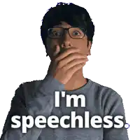 a man wearing glasses covering his mouth with his hand and the words i 'm speechless