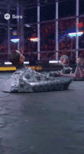 a video of a robot fighting with the word sora at the top