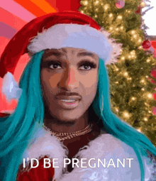 a woman with blue hair is wearing a santa hat and says " i 'd be pregnant "