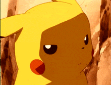 a close up of a pikachu 's face with a shadow on it