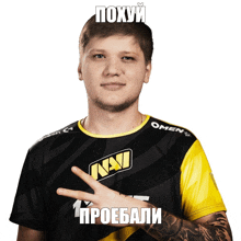 a man wearing a black and yellow navi shirt