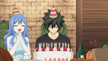 a man and a woman are celebrating a birthday