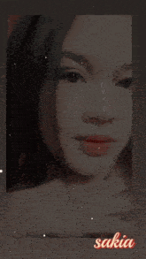 a girl with the name sakia on her face