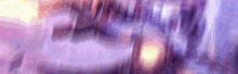 a purple background with a blurred image of a waterfall