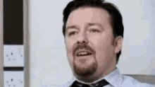 Ricky Gervais The Office GIF - Ricky Gervais The Office Middle Finger GIFs