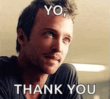 a man is smiling and saying `` yo , thank you '' while looking up .