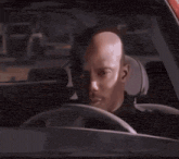 a man in a black shirt has a badge on his shoulder that says ' u.s. coast guard '