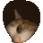 a pixelated image of a cat 's face with a black circle around it .