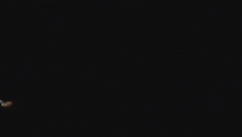 a cartoon character in a lab coat and goggles is walking in a dark room .