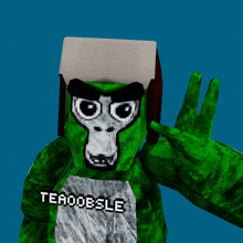 a green gorilla wearing a teaboobsle shirt